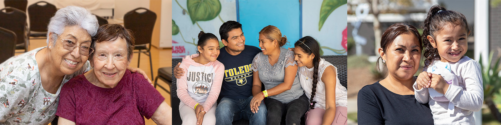 a family sitting on a bench, holding hands.